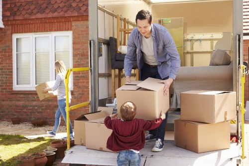 Loading furniture into a local removal van
