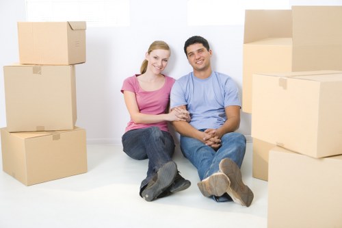 A local office relocation team loading furniture for transport