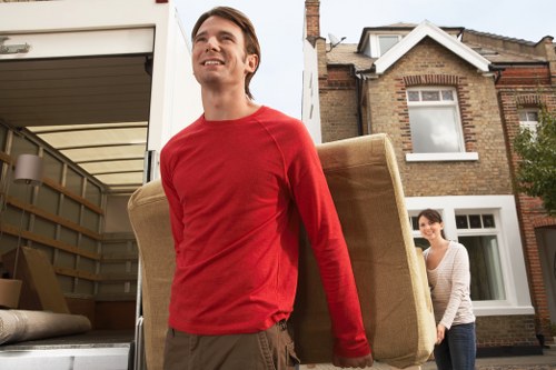 Brimsdown home removal service with boxes and furniture ready for transport