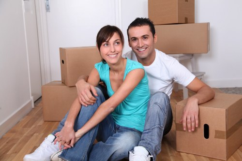 Packed moving boxes and furniture for a Brimsdown relocation