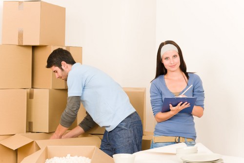 Loading furniture into a van for a Brimsdown move