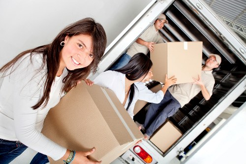 Careful loading of household items for a local Brimsdown removal